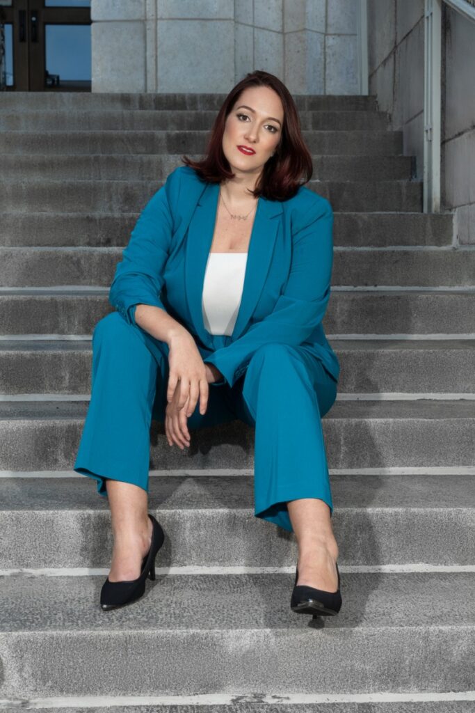Austin assault defense lawyer Angelica Cogliano of CMK Defense, PLLC on the courthouse steps