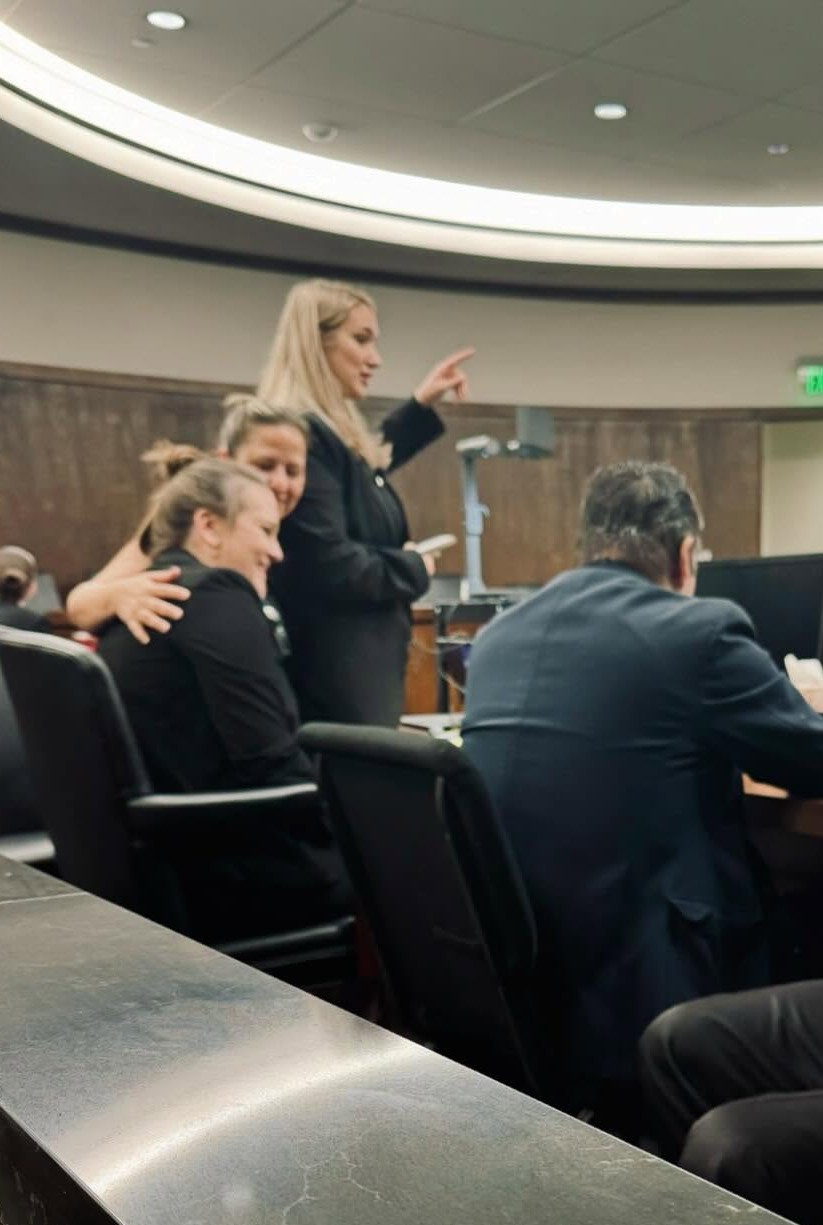Attorney Angelica Cogliano and co-counsel in the courtroom during a Comal County murder trial