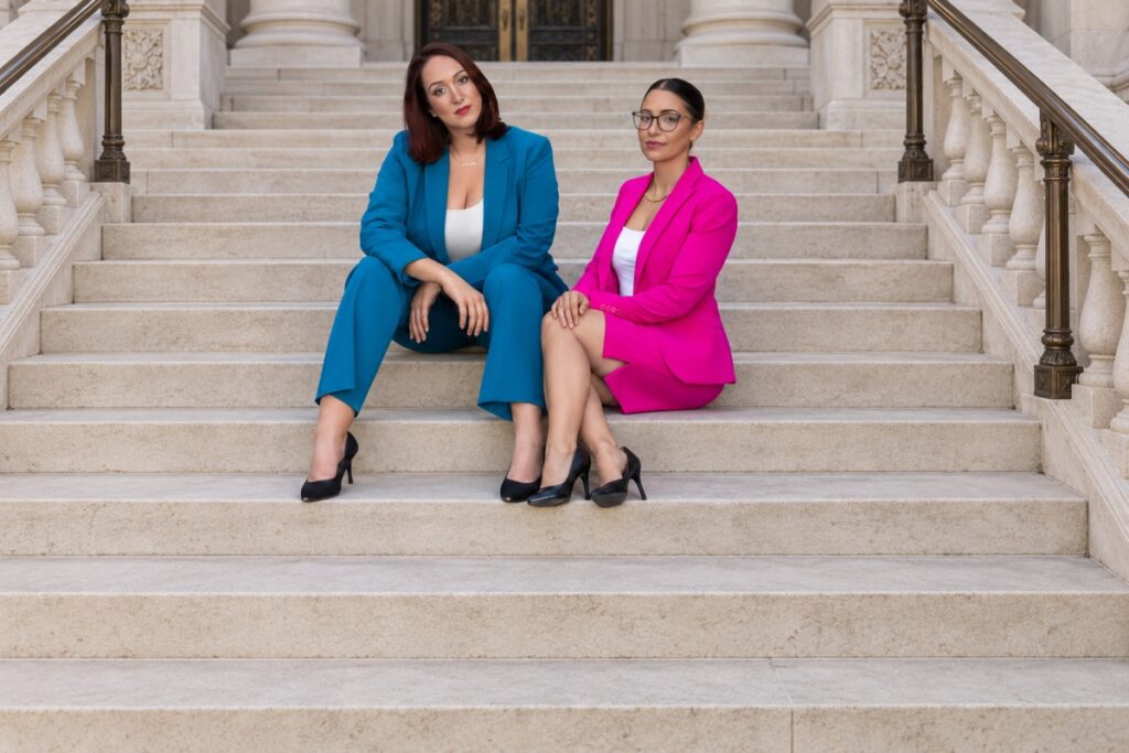 Austin domestic violence lawyers Angelica Cogliano and Deniz Kadirhan of CMK Defense, PLLC on the courthouse steps